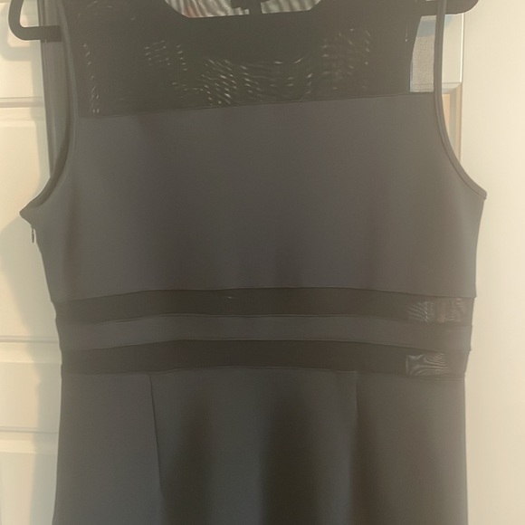New without tags. Black mesh cut out dress by Spense. Size 12. - Picture 6 of 10